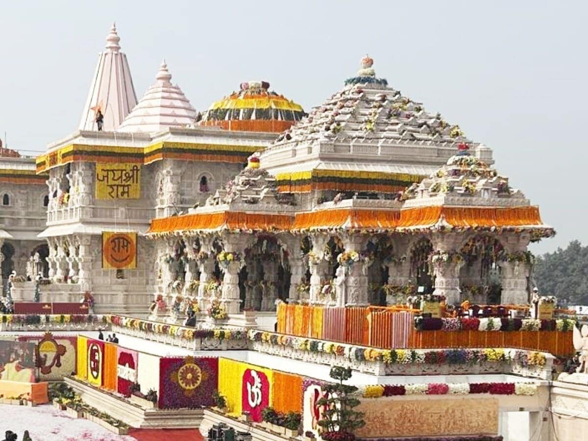 Ram Mandir temple construction site in Ayodhya with scaffolding and carved pillars
